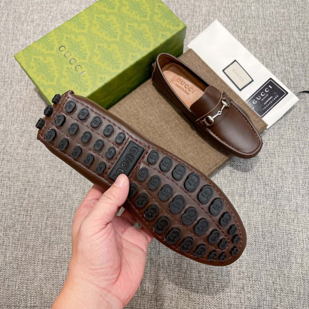 Gucci Brown Bit Loafers — model