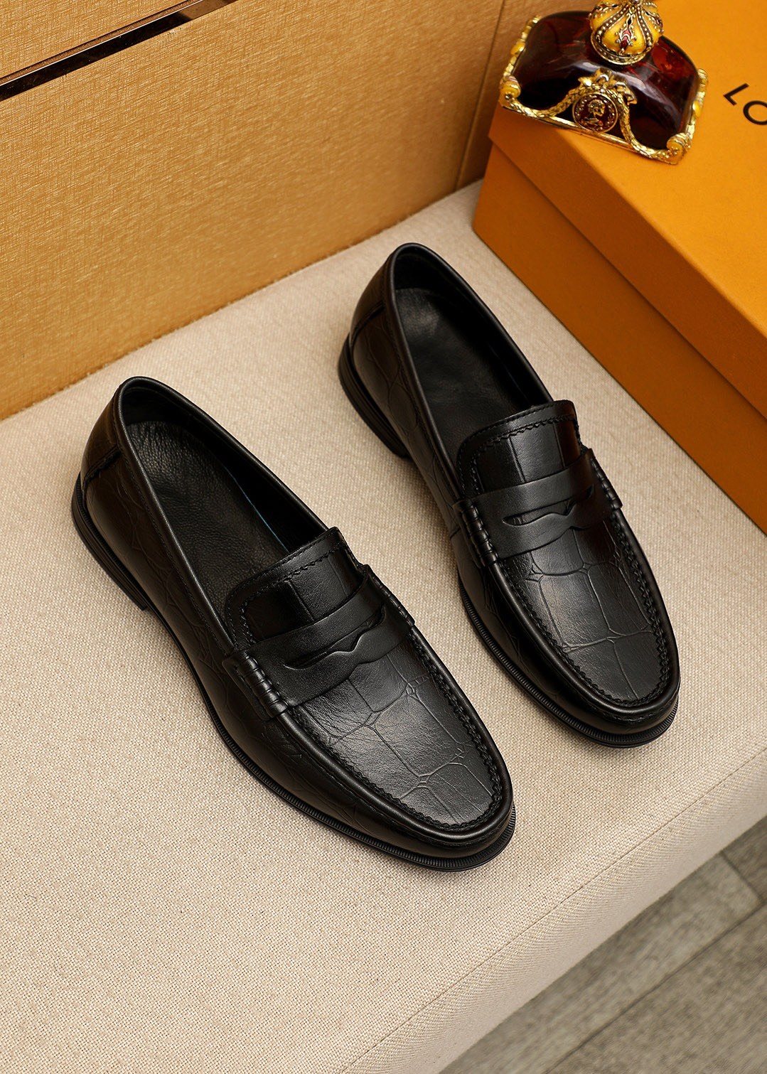Louis Vuitton Black Textured Slip-On Loafers — front