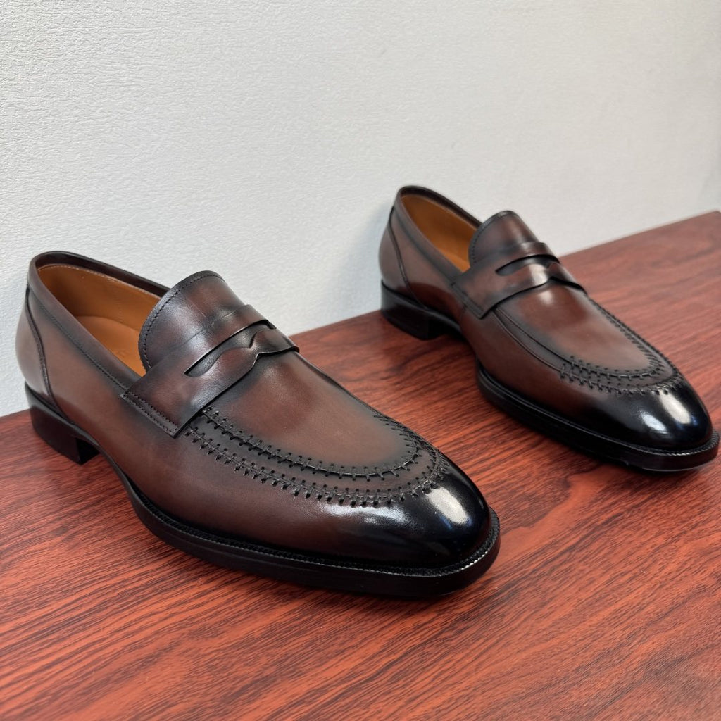 Berluti Burnished Penny Loafers — front