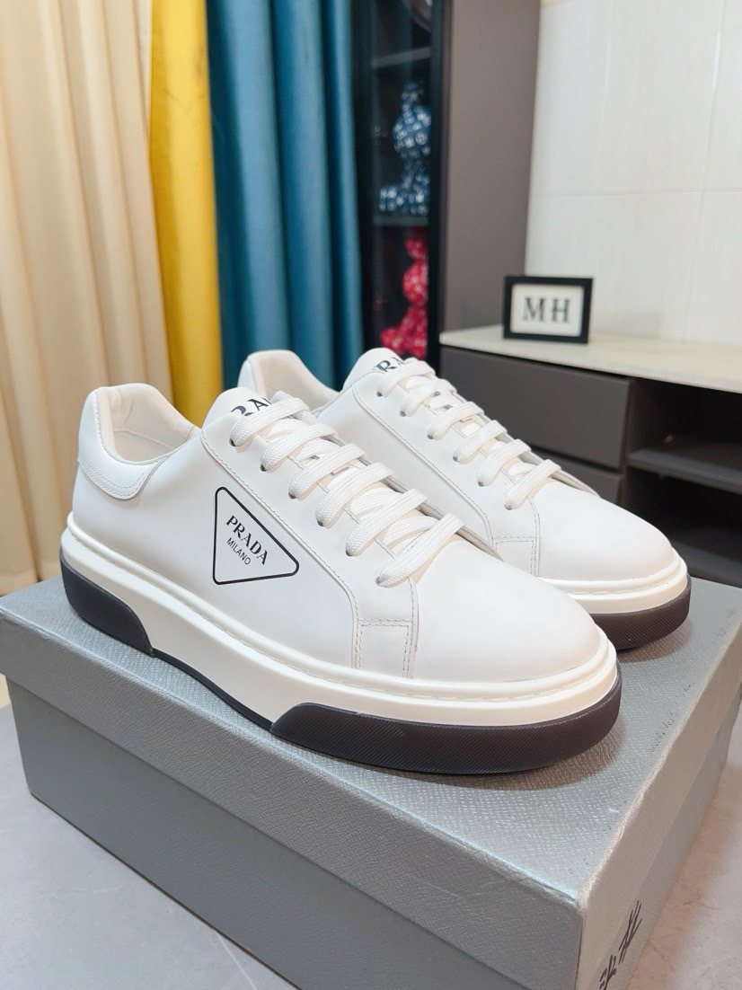 Prada Triangle Patch Low-Top Sneakers — front